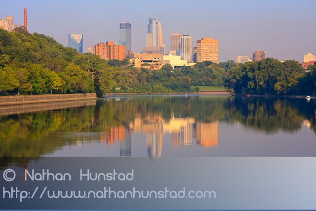 Downtown Minneapolis reflected in the Mississippi River.